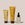 Three ACURE skin care products including a Brightening facial scrub, Zombie Cell Clarifying Serum and Radically rejuvenating whipped night cream moisturizer, arranged side by side against a neutral background.